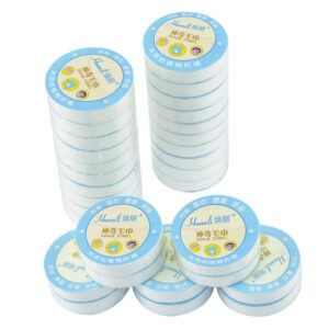 Disposable non-woven compressed towel